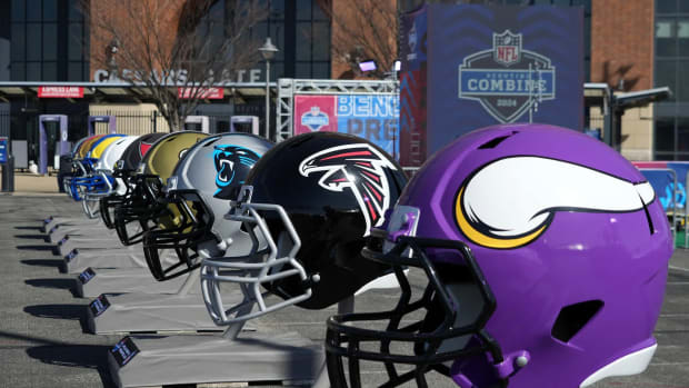 Team helmets lined up outside of the NFL Scouting Combine at Lucas Oil Field in Indianapolis, Indiana.